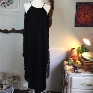 Black lace dress lines with asymmetrical hem